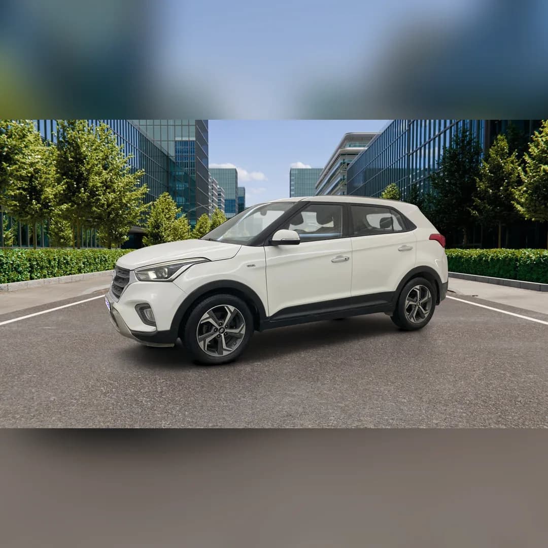Unedited catalogue photograph of a white Hyundai Creta